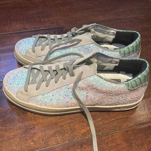 Sparkly P448 sneakers with green snake skin look heels.